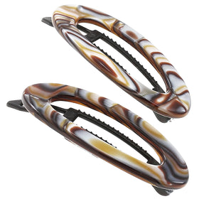 Camila Paris front packaging showing onyx barrettes and brand elegance
