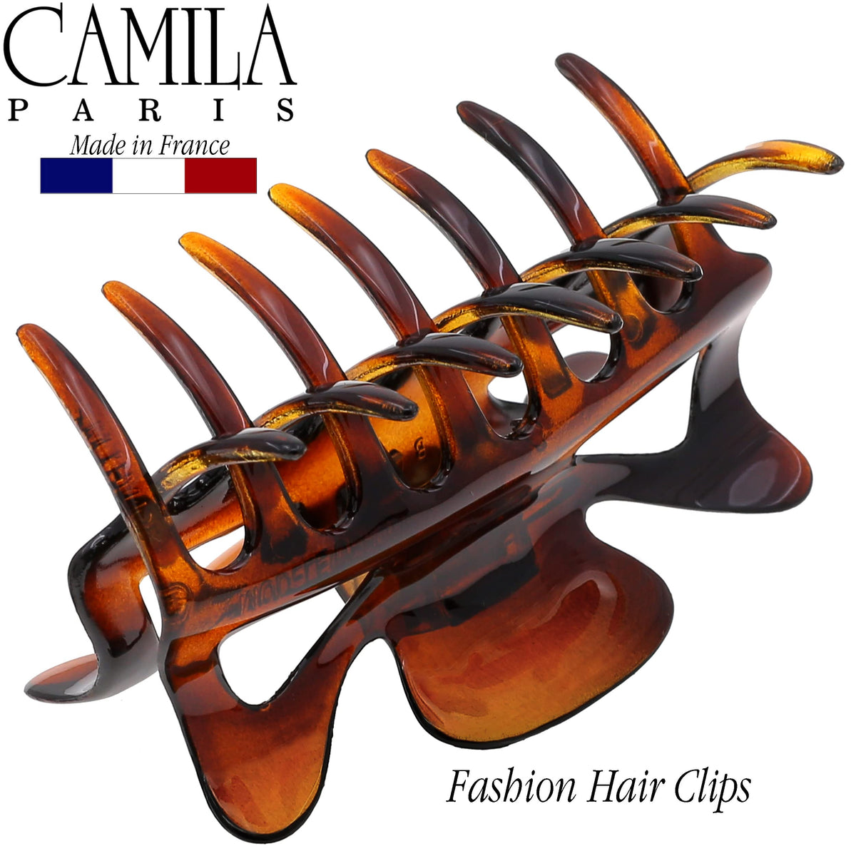 Camila Paris in half-up hairstyle demonstrating volumizing, polished look