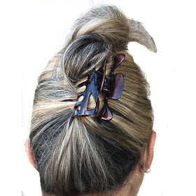 Camila Paris side profile highlighting the strong metal spring for firm grip