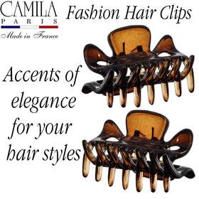 Camila Paris clip holding a thick hair section to show no-slip performance