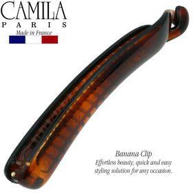 Camila Paris clip in use securing a twisted ponytail for quick, neat styling