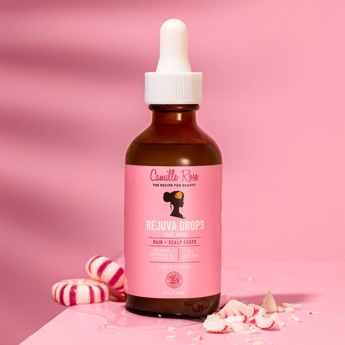 Camille Rose ingredient blend close-up showing oils and botanicals for nourishment