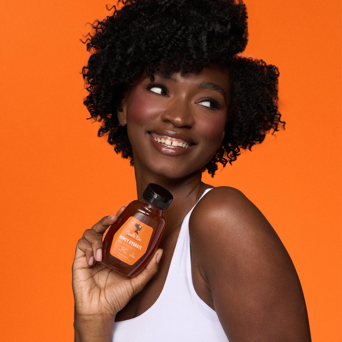 Camille Rose duo applied while twisting hair for defined curls