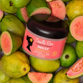 Camille Rose 8 oz jar in hand demonstrating true product size