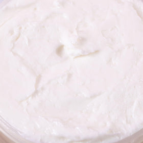 Camille Rose ingredient label close-up highlighting natural extracts and oils