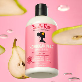Camille Rose conditioner applied to hair, helping detangle and smooth