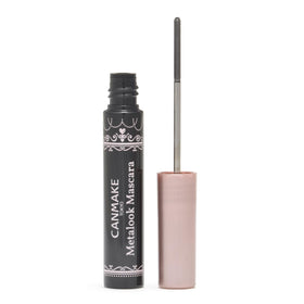 CANMAKE close-up of stainless-steel ultra-fine comb highlighting precision application