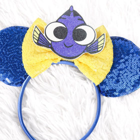 CANMIL front view showing blue sequin ears and central bow, playful sparkle