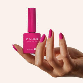 CANNI 9ml bottle held in hand showing compact size and travel-friendly volume