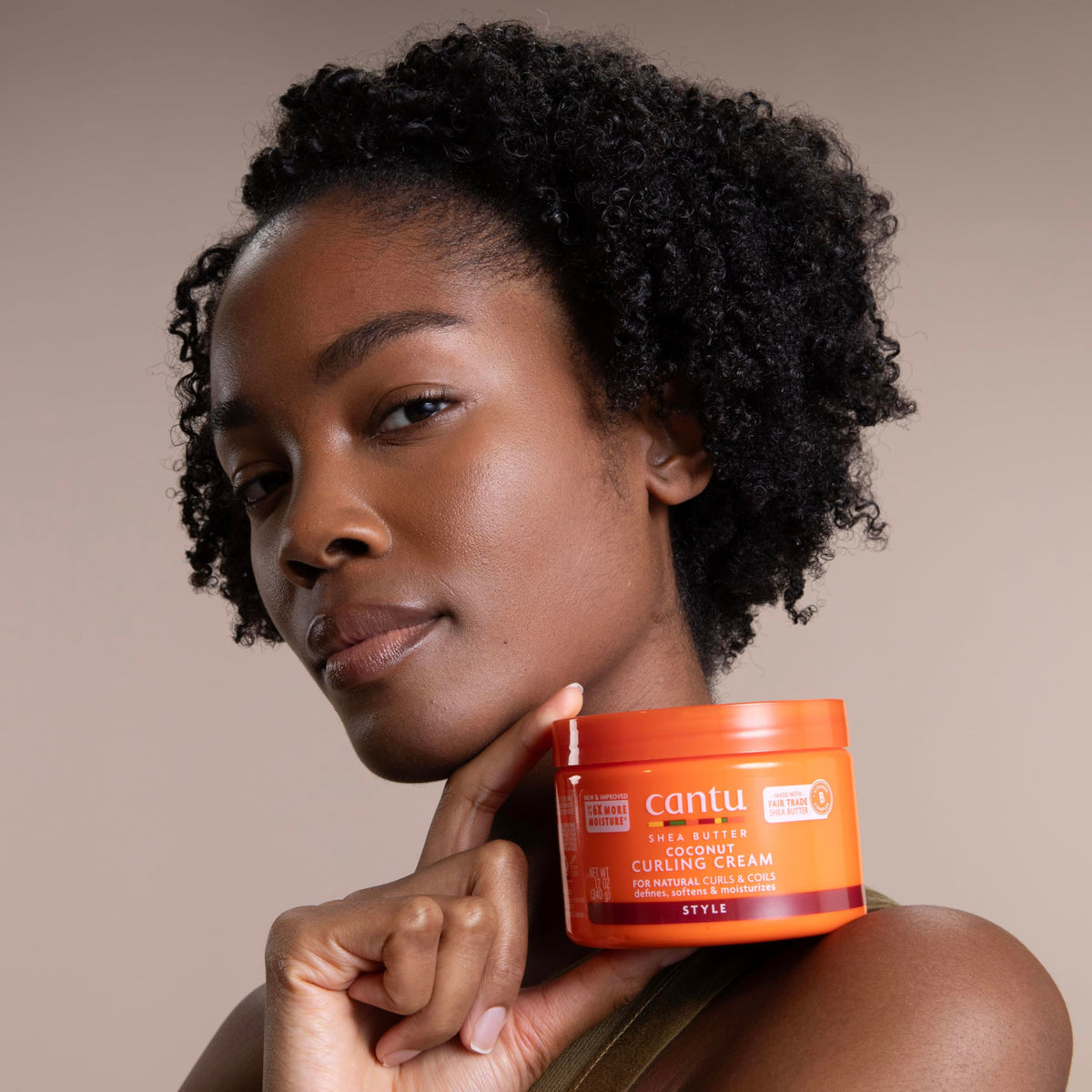 Cantu before and after curly hair showing improved definition