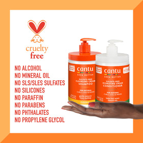 Cantu conditioner spread on curly ends, helping reduce breakage