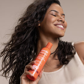 Cantu curl activator before and after styling showing defined curls