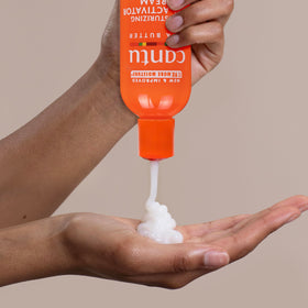 Cantu curl activator being diffused into damp curls to boost volume