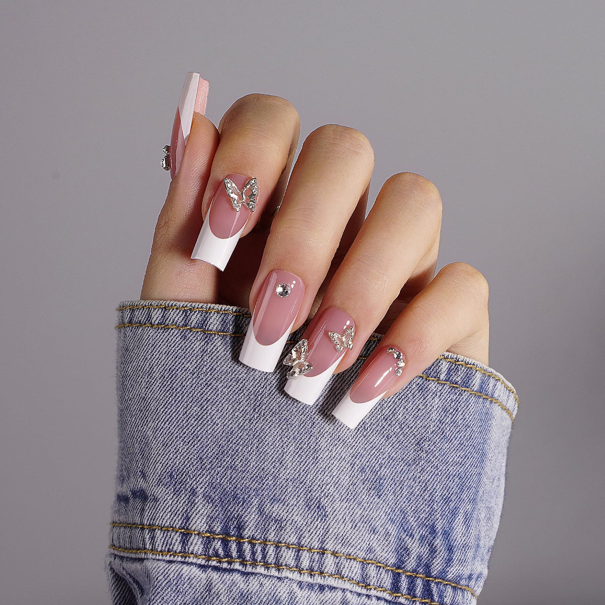 CANVALITE nails being glued on demonstrating fast application and secure hold