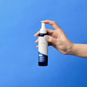 Capri Blue spray mist in motion delivering lightweight hydration