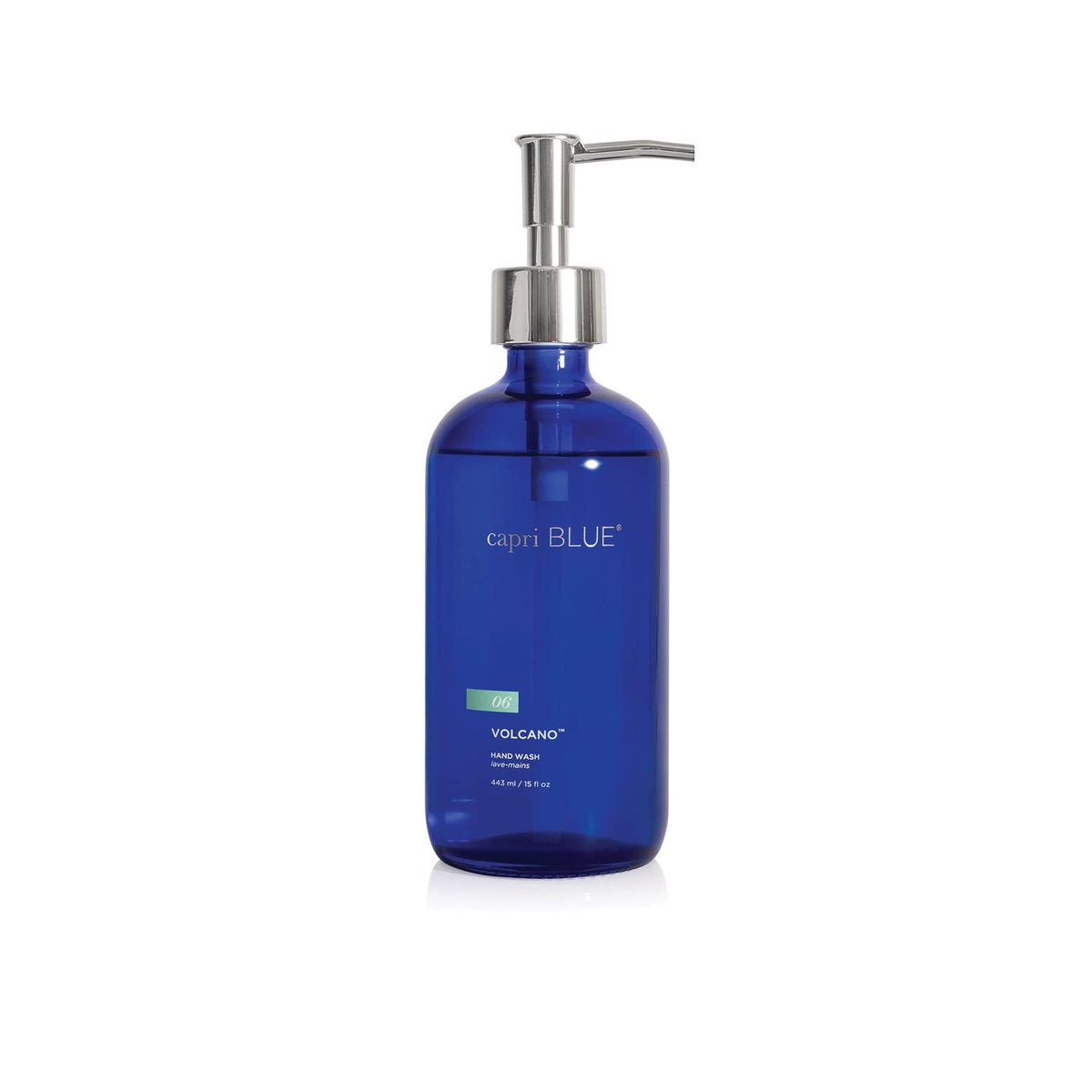 Capri Blue front bottle showing cobalt glass and Volcano scent benefits