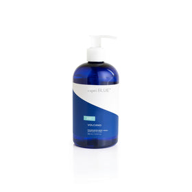 Capri Blue front pump bottle showcasing elegant cobalt-blue packaging and easy dispensing