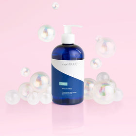 Capri Blue Volcano pouring into hand and lathering to show gentle, moisturizing foam
