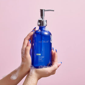 Capri Blue pump close-up highlighting durable dispenser and refill benefit