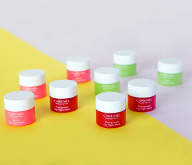 CARE:NEL fruit ingredients display showing natural extracts and nourishment