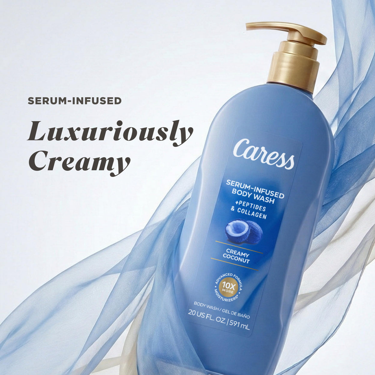 Four-pack of Caress Creamy Coconut bottles stacked to show multi-bottle value