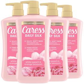 Caress bottle front packaging showing white peach orange blossom scent benefit