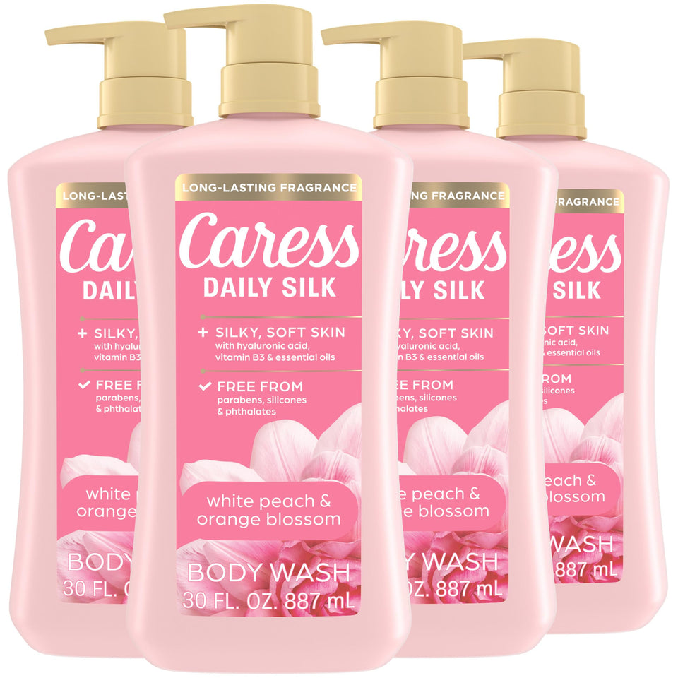 Caress bottle front packaging showing white peach orange blossom scent benefit