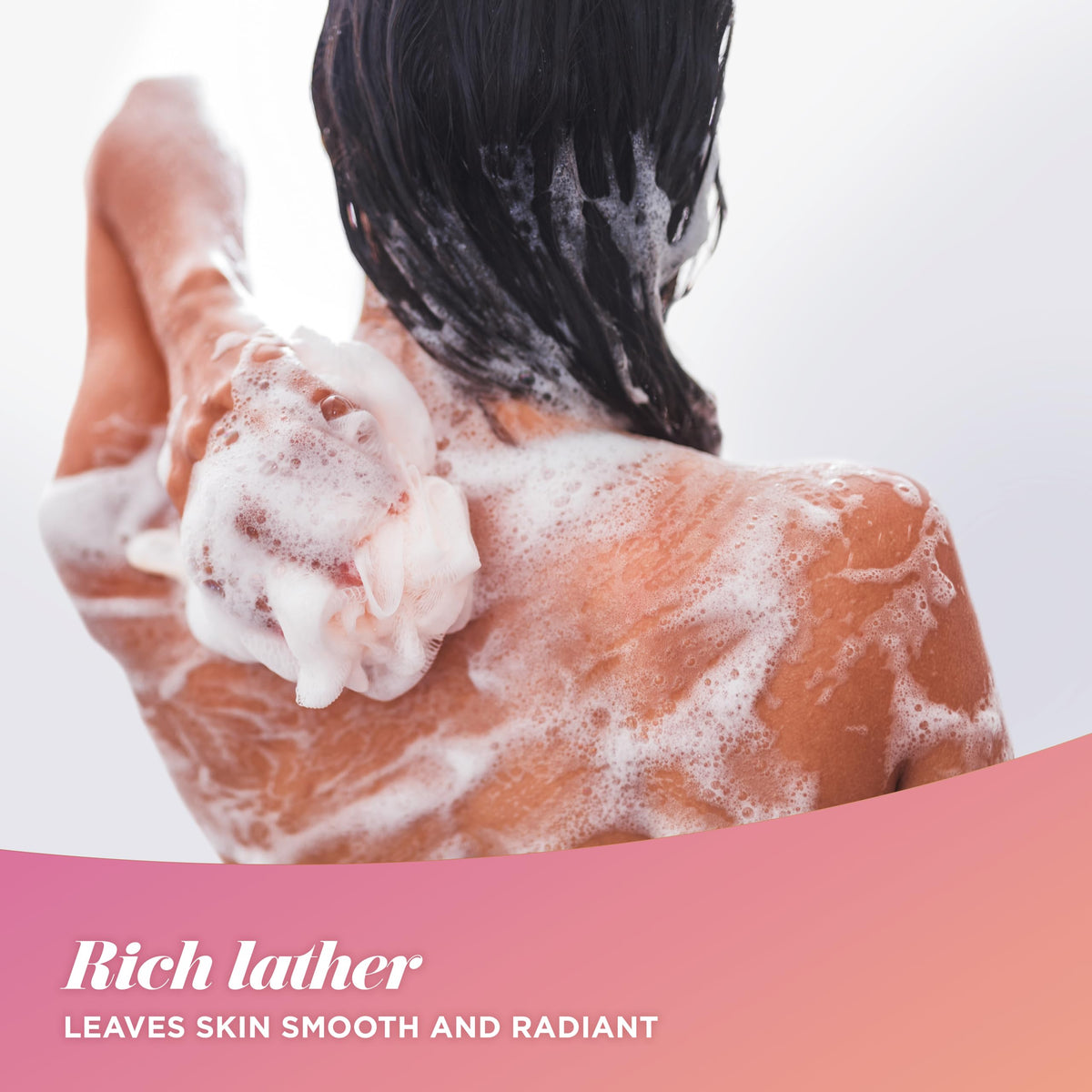 Caress body wash foam on arm in shower demonstrating gentle cleansing and softness
