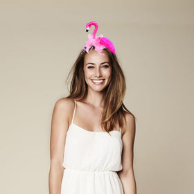 CARMELIT flamingo headband stored flat to show care and shape-preserving method