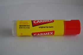 Close-up of Carmex tube tip and balm texture for easy smooth application