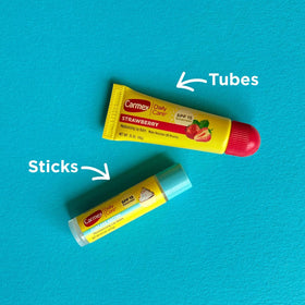 Carmex tube being squeezed to show product consistency and ease