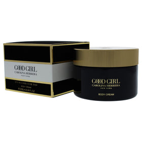 Carolina Herrera body cream on dressing table suggesting scented daily ritual
