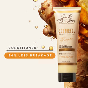 Carol's Daughter hands applying conditioner to wet hair showing detangling benefit