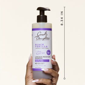 Carol's Daughter back label close-up highlighting ingredient list and product benefits