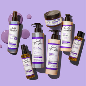 Carol's Daughter set in shower demonstrating gentle lather benefit