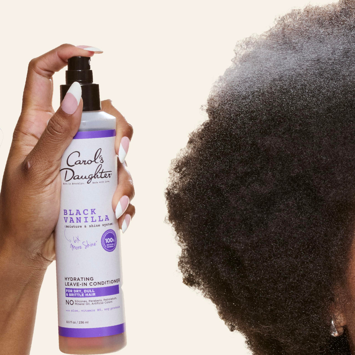 Carol's Daughter mist texture on hair strands for lightweight moisture
