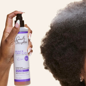 Carol's Daughter mist texture on hair strands for lightweight moisture