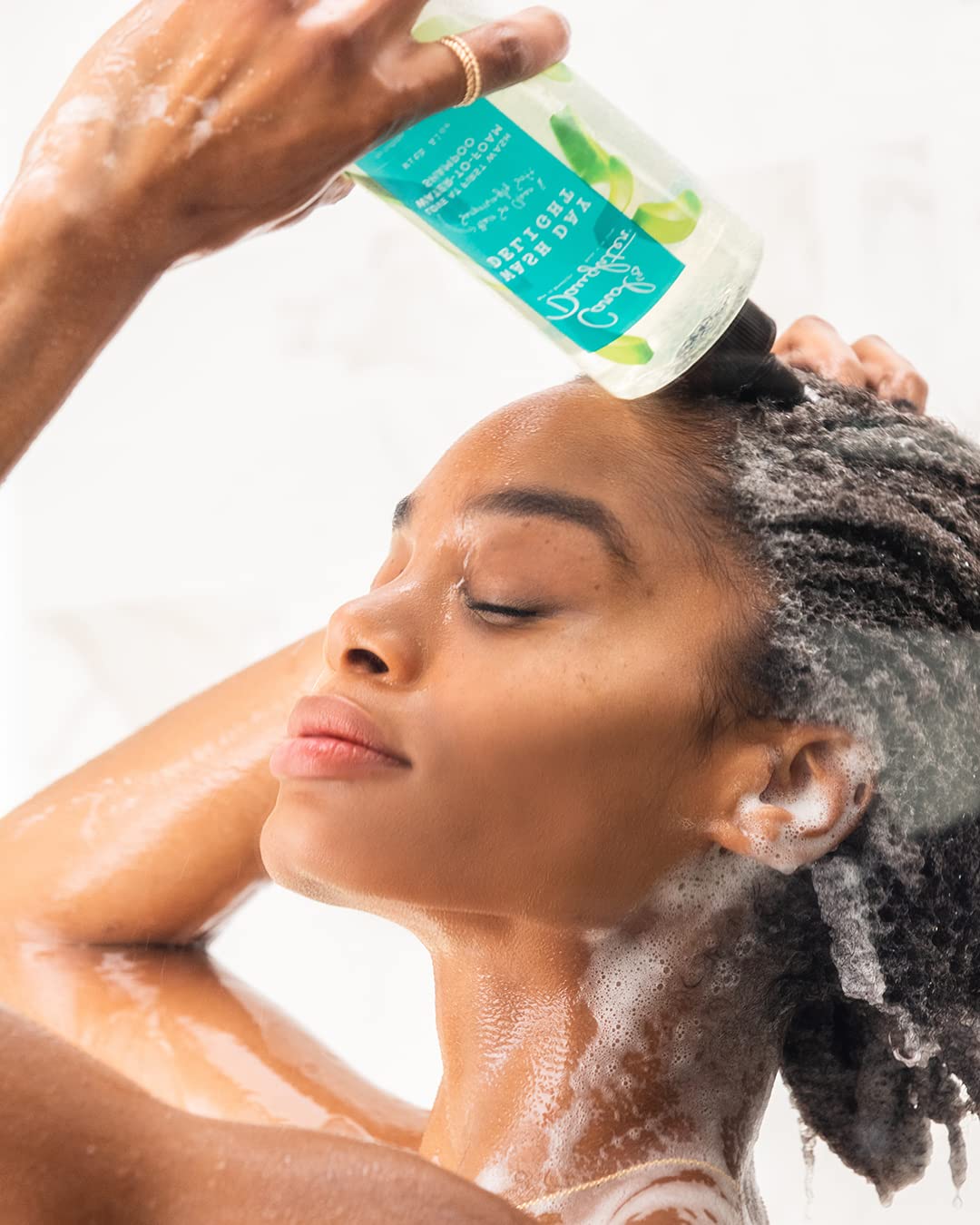 Carol's Daughter label close-up highlighting aloe and micellar tech for gentle cleansing