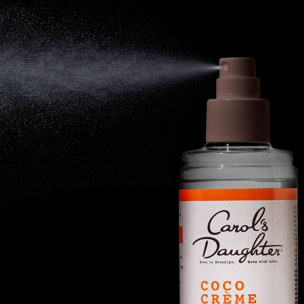Carol's Daughter product next to ruler highlighting 8.4 fl oz and recycled bottle