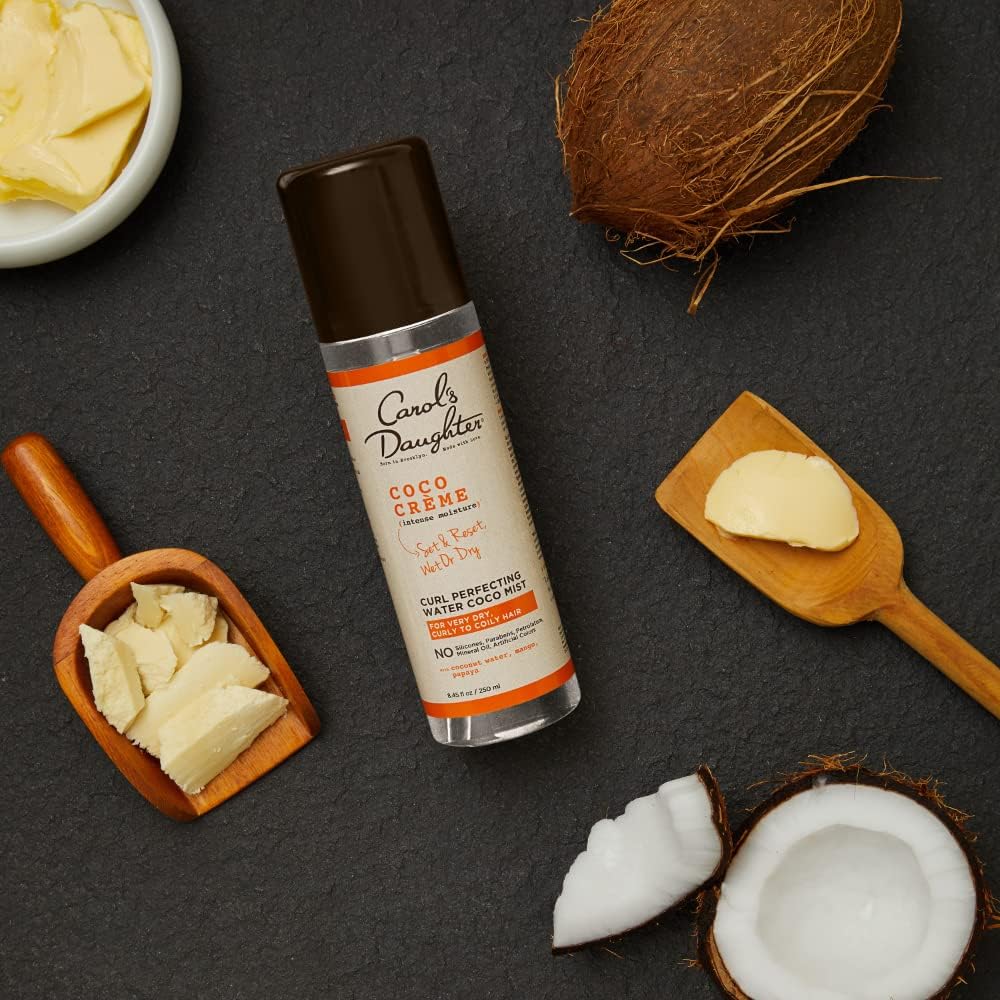 Carol's Daughter spray in use on curly hair for instant refresh
