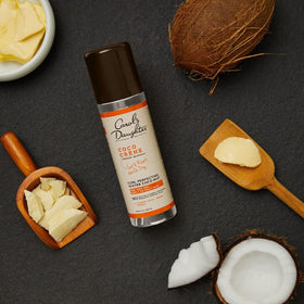 Carol's Daughter spray in use on curly hair for instant refresh