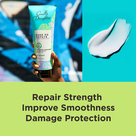Carol's Daughter conditioner being applied in shower for smoother curls