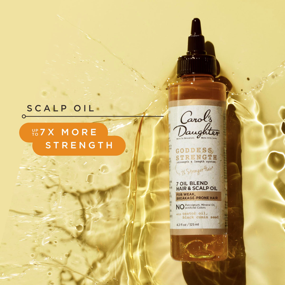 Carol's Daughter arrangement of seven key oils illustrating natural ingredients