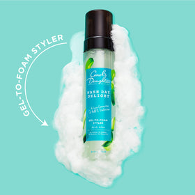 Carol's Daughter styled curls in outdoor setting showing frizz control and natural finish