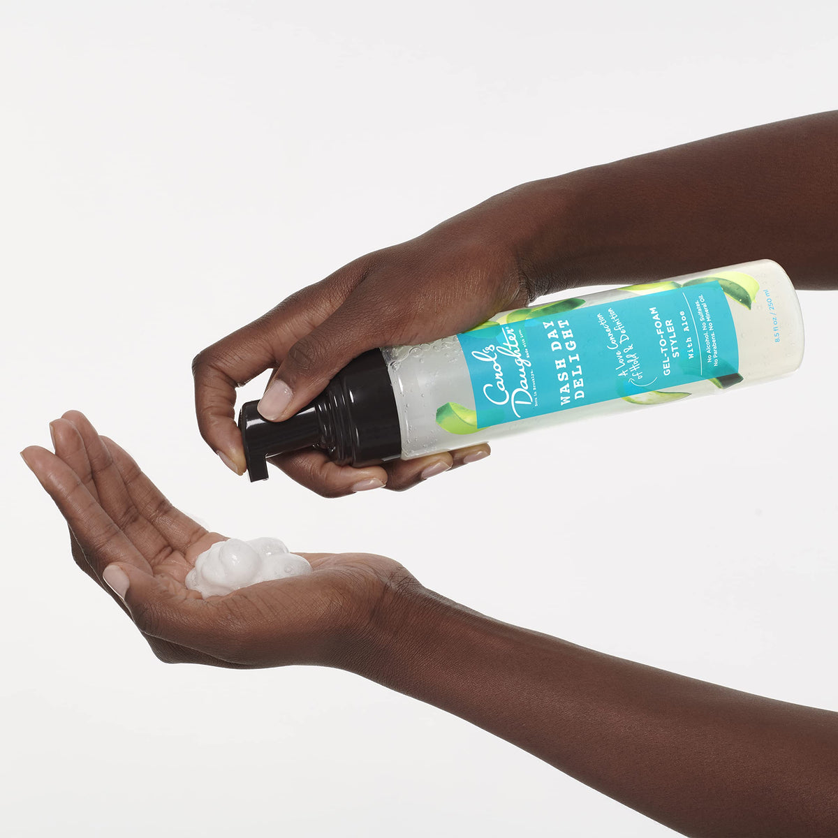 Carol's Daughter applied during diffuse drying illustrating enhanced curl shape and hold