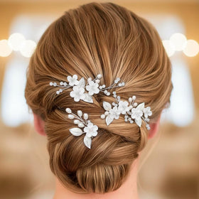 CASDRE pins styled in side-swept hair adding delicate bridal accent