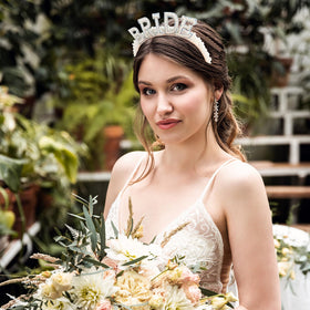 Casoty headband worn by bride demonstrating polished hairstyle enhancement