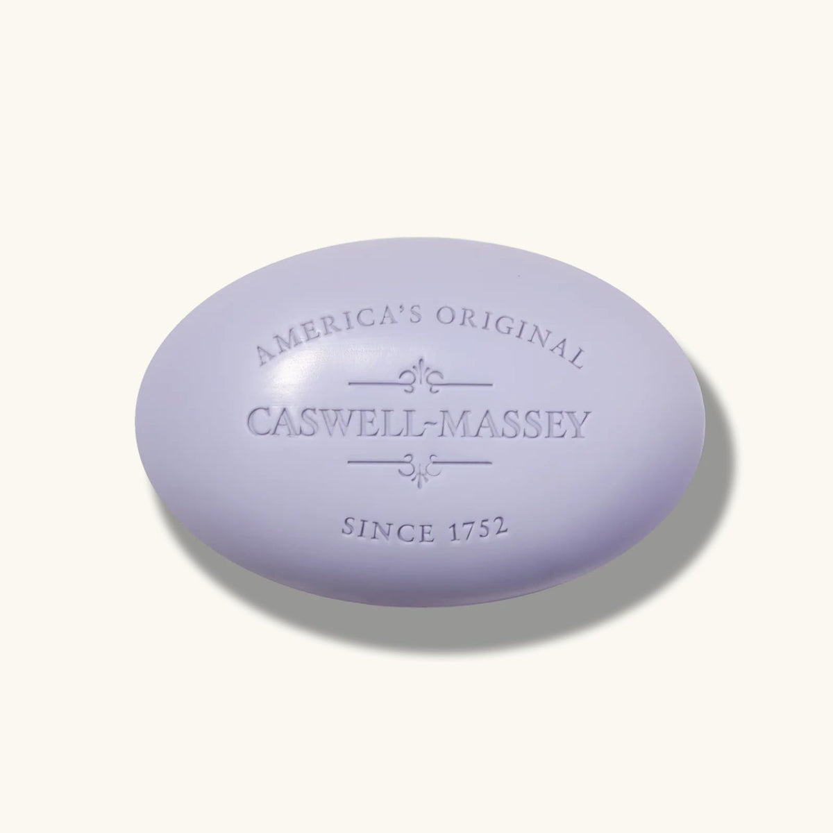 Caswell-Massey bar in bathroom setting evoking calming lavender ambiance and relaxation