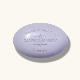 Caswell-Massey bar in bathroom setting evoking calming lavender ambiance and relaxation
