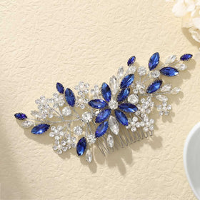 Catery front view of blue rhinestone bridal comb showing sparkly flowers and comb teeth